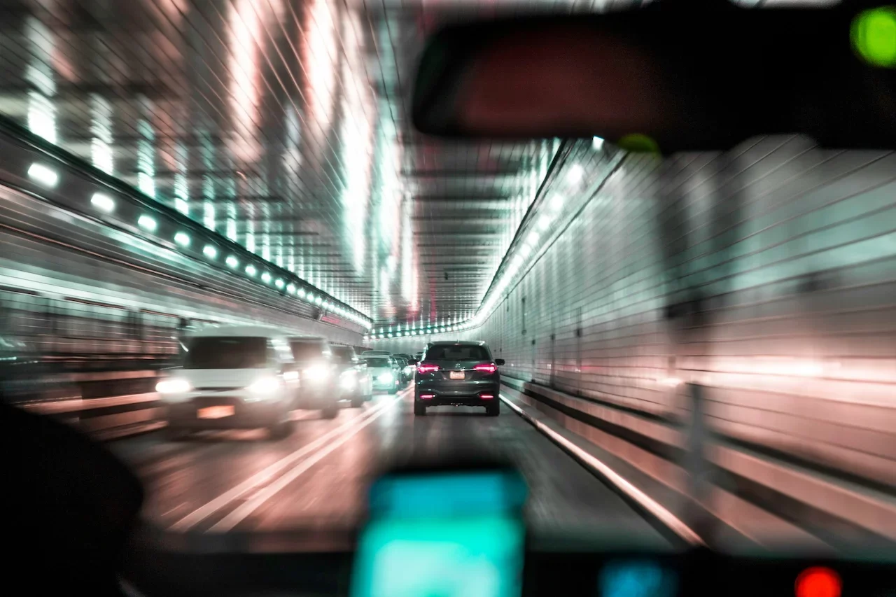 white and black car on road
